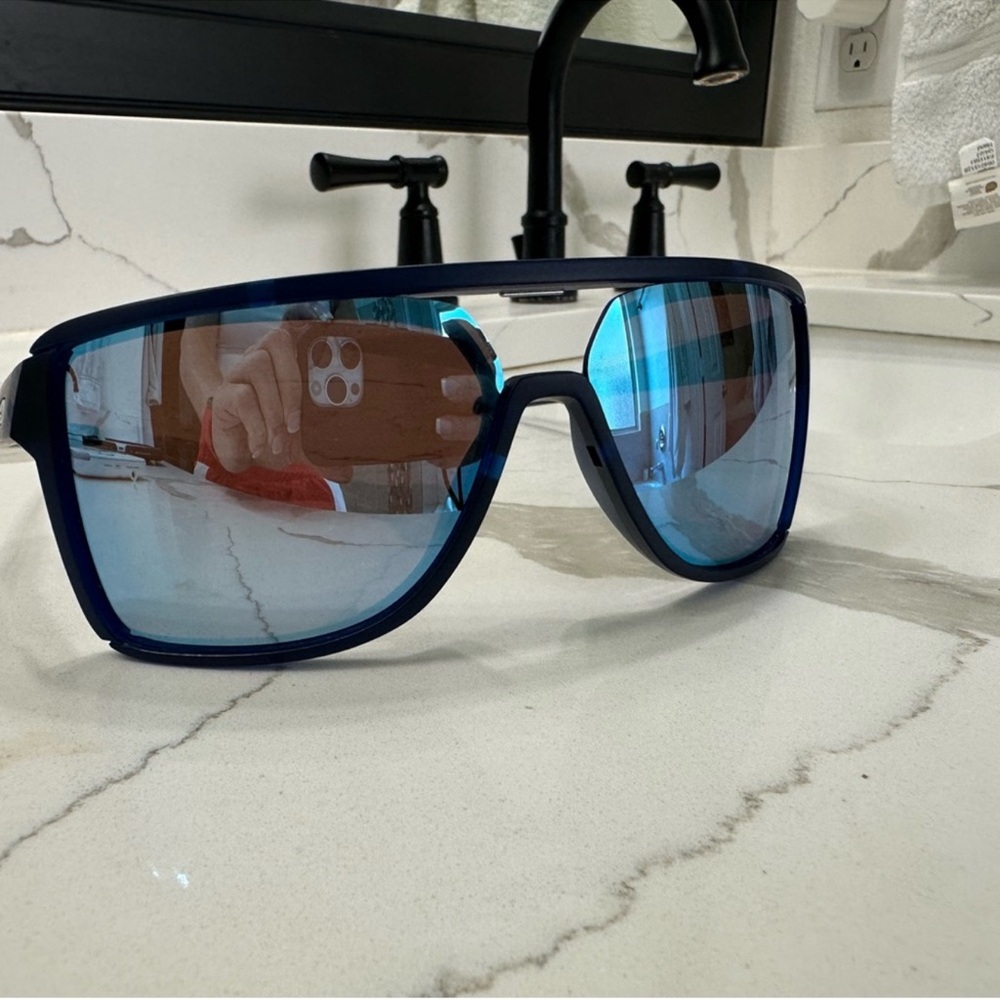 Oakley castel Prizm Deep Water Polarized Lenses, 
Matte Translucent Blue Frame